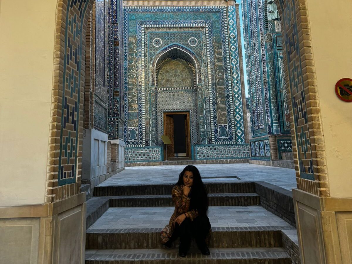 solo female traveler at Shah-i-Zinda necropolis Samarkand Uzbekistan