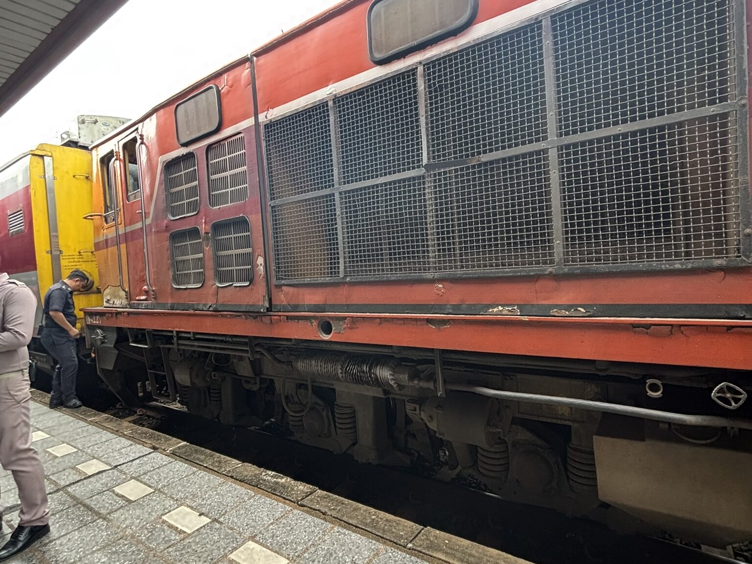 Train No. 133 locomotive at the platform during the Nong Khai immigration stop on the Bangkok to Vientiane route