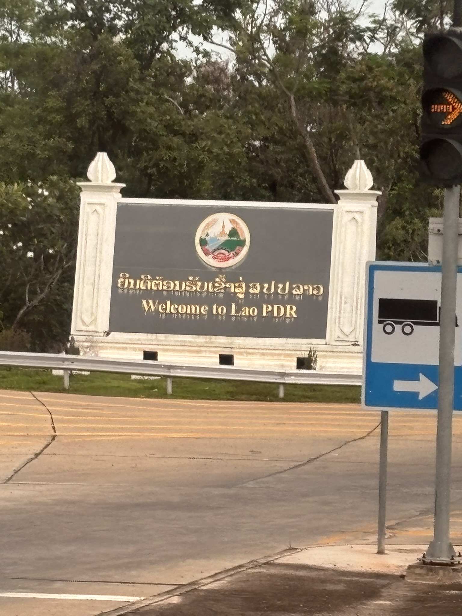 Welcome to Lao PDR sign at the Laos border crossing near Vientiane Khamsavath station