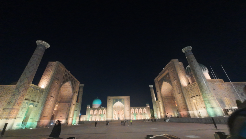 The image shows the Registan Square in Samarkand, Uzbekistan, a historic site renowned for its Islamic architecture.